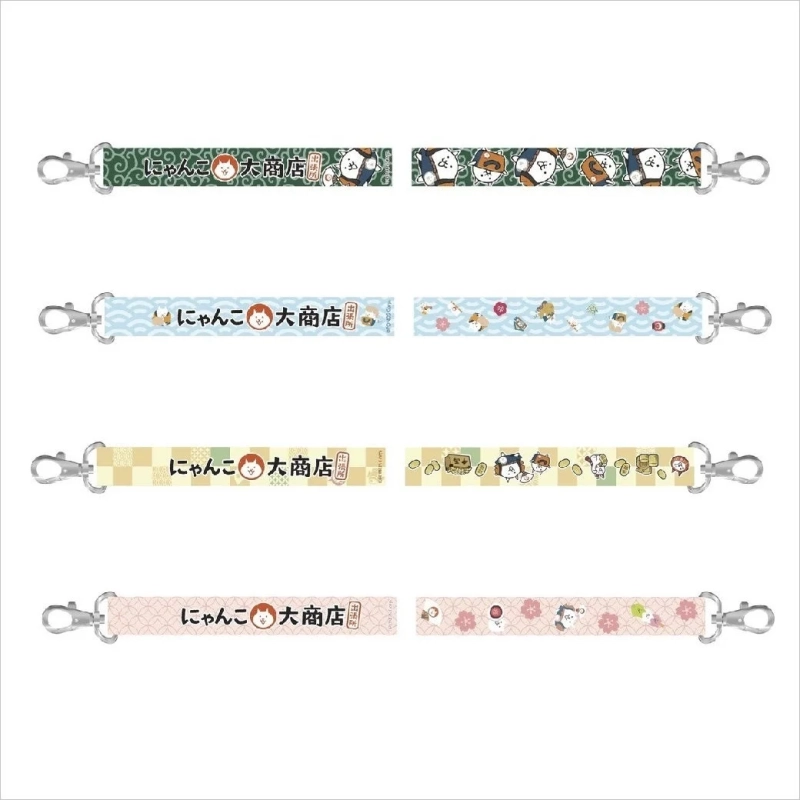 にゃんこ大商店のロゴと様々な猫のキャラクターがデザインされたキーホルダー