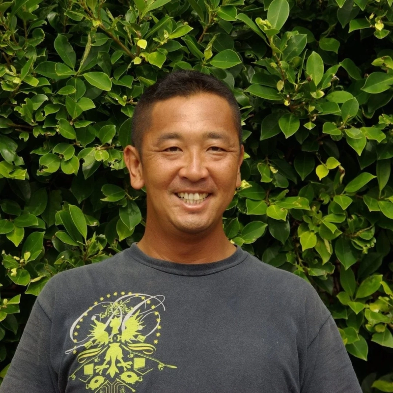 笑顔の男性（竹澤 博隆氏）