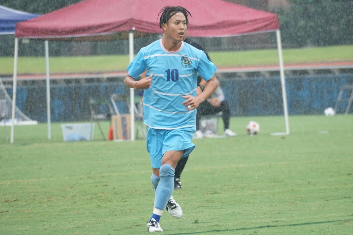 雨の中を走る大野選手