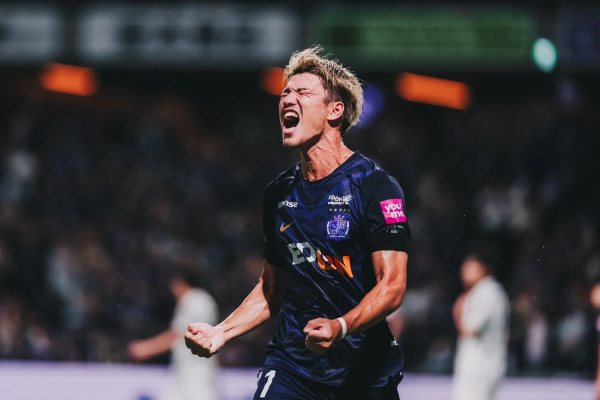 歓喜するサッカー選手